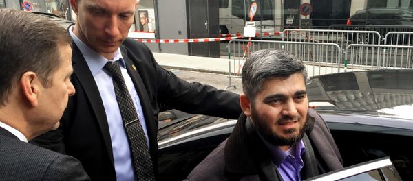 Army of Islam official Mohammed Alloush, gets in to a car heading to a meeting with the opposition's High Negotiations Committee, in Geneva, Switzerland. (File) - Sputnik International