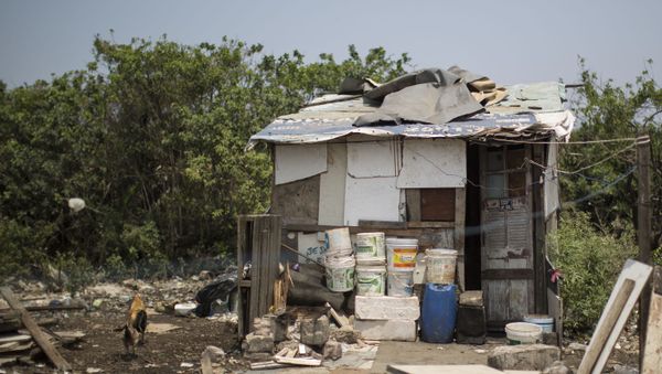 Home in a shantytown on the outskirts of Rio de Janeiro, Brazil. (File) Home in a shantytown on the outskirts of Rio de Janeiro, Brazil. (File) - Sputnik International