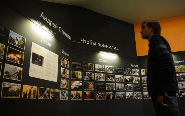 Photographic exhibition of MIA Rossiya Segodnya news agency photo correspondent Andrei Stenin killed in Ukraine on professional duty. - Sputnik International