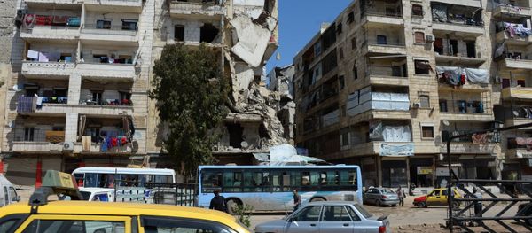 Local citizens continue to live in destroyed buildings in the Salah ad-Din District in Aleppo Local citizens continue to live in destroyed buildings in the Salah ad-Din District in Aleppo - Sputnik International