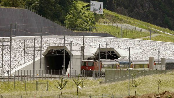 A train drives past the northern gates of the NEAT Gotthard Base Tunnel near the town of Erstfeld, Switzerland March 31, 2016 A train drives past the northern gates of the NEAT Gotthard Base Tunnel near the town of Erstfeld, Switzerland March 31, 2016 - Sputnik International