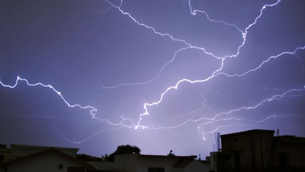 Lightning breaks during a thunderstorm in the Pakistani capital Islamabad on June 1, 2016 - Sputnik International