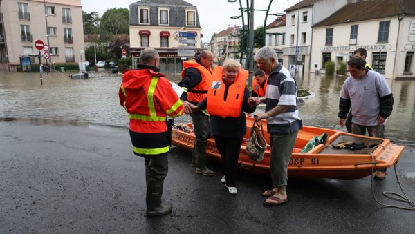 Firefighters evacuate people in a small boat from a flooded street after the Yvette river burst its banks and forced residents to be evacuated in Longjumeau, some 20kms south of Paris, on June 2, 2016 Firefighters evacuate people in a small boat from a flooded street after the Yvette river burst its banks and forced residents to be evacuated in Longjumeau, some 20kms south of Paris, on June 2, 2016 - Sputnik International