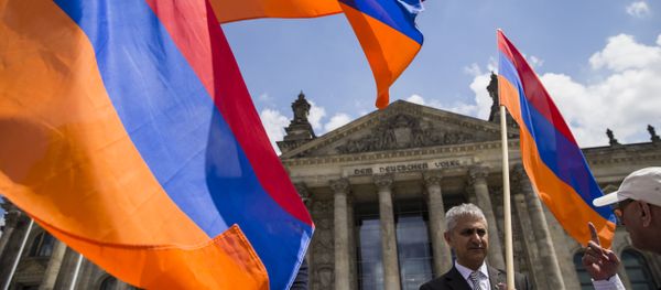 Armenian activists wave flags outside the Bundestag after law makers voted to recognise the Armenian genocide after a debate during the 173rd sitting of the German lower house of parliament, in Berlin on June 2, 2016 Armenian activists wave flags outside the Bundestag after law makers voted to recognise the Armenian genocide after a debate during the 173rd sitting of the German lower house of parliament, in Berlin on June 2, 2016 - Sputnik International