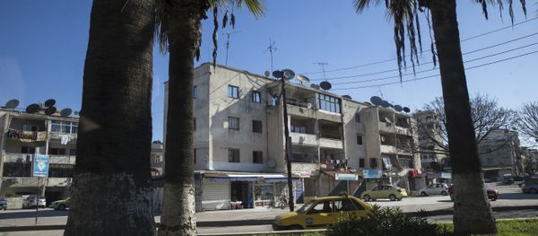 In this photo taken on Tuesday, March 1, 2016, a car passes on a street in Latakia, Syria In this photo taken on Tuesday, March 1, 2016, a car passes on a street in Latakia, Syria - Sputnik International