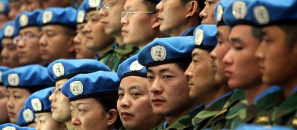 Chinese peacekeepers prepare to depart for their United Nations mission to Sudan from an airport in Zhengzhou, central Chinas Henan province, in this Tuesday, Jan. 16, 2007 file photo - Sputnik International