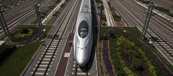 A CRH high-speed train leaves the Beijing South Station in Beijing, China, Tuesday, July 26, 2011 - Sputnik International