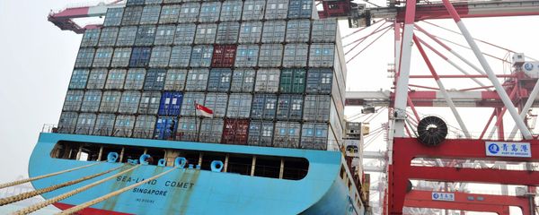 This photo taken on April 12, 2016 shows trucks transporting containers at a port in Qingdao, east China's Shandong province This photo taken on April 12, 2016 shows trucks transporting containers at a port in Qingdao, east China's Shandong province - Sputnik International