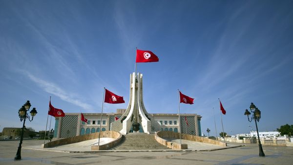 Flags of Tunisia flutter at the city hall in Tunis on October 24, 2011 - Sputnik International