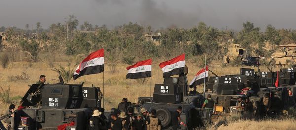 Smoke billows on the horizon as Iraqi military forces prepare for an offensive into Fallujah to retake the city from Islamic State militants in Iraq, Monday, May 30, 2016 Smoke billows on the horizon as Iraqi military forces prepare for an offensive into Fallujah to retake the city from Islamic State militants in Iraq, Monday, May 30, 2016 - Sputnik International
