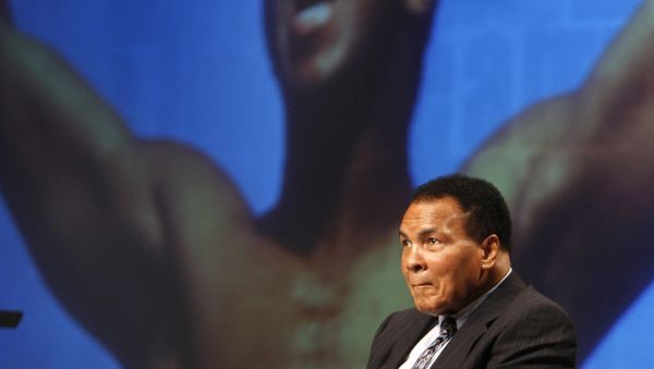 Muhammad Ali sits on the stage during an announcement marking a new philanthropic initiative in the Lexington Convention Center in Lexington, Ky., Tuesday, May 19, 2009 - Sputnik International