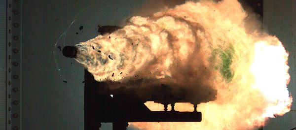 Photograph taken from a high-speed video camera during a record-setting firing of an electromagnetic railgun (EMRG) at Naval Surface Warfare Center, Dahlgren, Va., on January 31, 2008 - Sputnik International