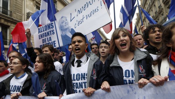 Supporters of French far-right party Front National (FN) shout and hold a banner reading in French the Future is us as they take part in the annual party's rally in honour of Jeanne d'Arc (Joan of Arc) on May 1, 2015 in Paris Supporters of French far-right party Front National (FN) shout and hold a banner reading in French the Future is us as they take part in the annual party's rally in honour of Jeanne d'Arc (Joan of Arc) on May 1, 2015 in Paris - Sputnik International