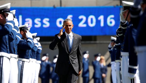 U.S. President Barack Obama walks the honour cordon as he arrives to participate in the U.S. Air Force Academy commencement ceremony in Colorado Springs, Colorado, U.S., June 2, 2016 - Sputnik International