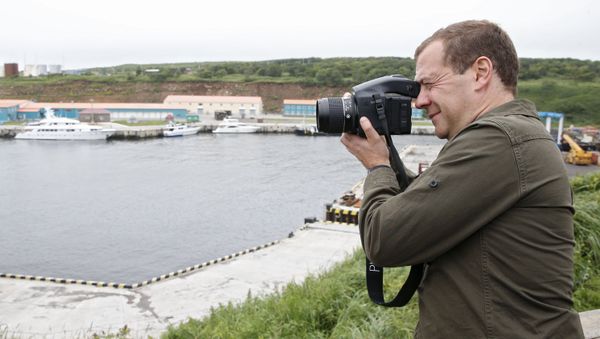 Russian Prime Minister Dmitry Medvedev on a tour of the Kurilsky port station in the township of Kitovy on Iturup, one of the Kuril Islands. (File) Russian Prime Minister Dmitry Medvedev on a tour of the Kurilsky port station in the township of Kitovy on Iturup, one of the Kuril Islands. (File) - Sputnik International
