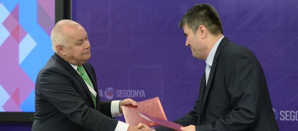 Dmitry Kiselev, left, Director General, Rossiya Segodnya International Information Agency, with Ahmed Dawa (Syria), Director General and Editor-In-Chief, Syrian Arab News Agency (SANA) - Sputnik International