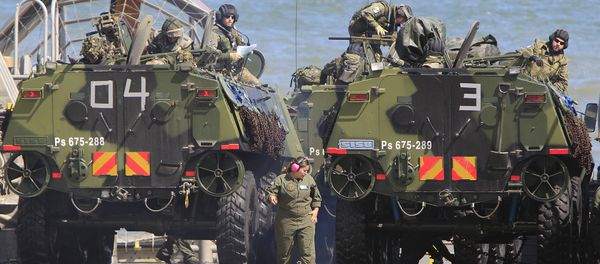 Soldiers park their amphibious vehicles on a ship as they participate in a massive amphibious landing during NATO sea exercises BALTOPS 2015 that are to reassure the Baltic Sea region allies in the face of a resurgent Russia, in Ustka, Poland, Wednesday, June 17, 2015 Soldiers park their amphibious vehicles on a ship as they participate in a massive amphibious landing during NATO sea exercises BALTOPS 2015 that are to reassure the Baltic Sea region allies in the face of a resurgent Russia, in Ustka, Poland, Wednesday, June 17, 2015 - Sputnik International