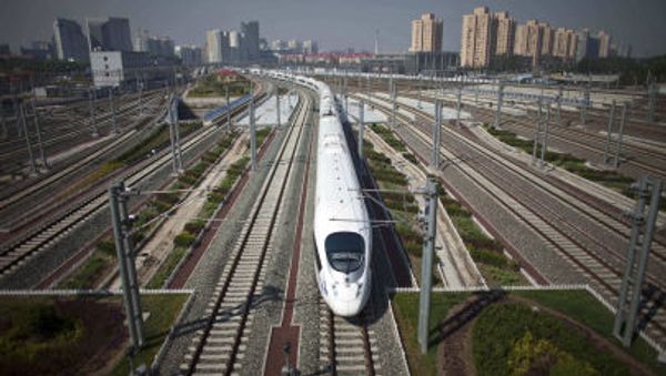 CRH high-speed train leaves the Beijing South Station for Shanghai during a test run on the Beijing-Shanghai high-speed railway in Beijing, China - Sputnik International