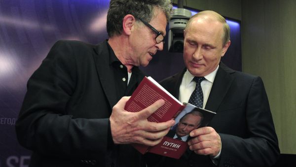 June 7, 2016. Right: Russian President Vladimir Putin, right, during presentation of the book Putin: the Logic of Power by German journalist Hubert Seipel during the International Media Forum New Era of Journalism: Farewell to Mainstream. at the International Multimedia Press Center of the Rossiya Segodnya International Information Agency. Left: Hubert Seipel, a journalist with Germany's ARD / NDR television & radio companies. - Sputnik International