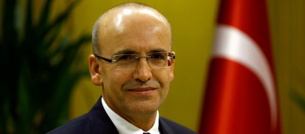 Turkish Deputy Prime Minister Mehmet Simsek poses during an interview with Reuters in Ankara, Turkey. - Sputnik International