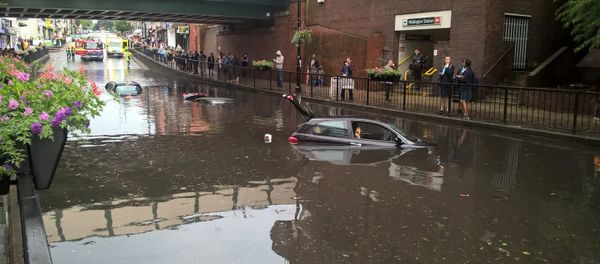 Cars are seen submerged in deep water on a flooded street in London on June 7, 2016, in this handout picture from London Fire Brigade Cars are seen submerged in deep water on a flooded street in London on June 7, 2016, in this handout picture from London Fire Brigade - Sputnik International