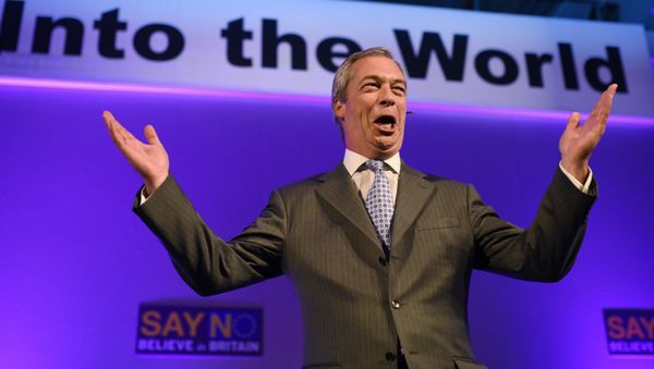 UK Independence Party (UKIP) leader Nigel Farage, reacts as he addresses delegates during his keynote speech to the UKIP National Conference at Doncaster Racecourse, in Doncaster, northern England on September 25, 2015. UK Independence Party (UKIP) leader Nigel Farage, reacts as he addresses delegates during his keynote speech to the UKIP National Conference at Doncaster Racecourse, in Doncaster, northern England on September 25, 2015. - Sputnik International