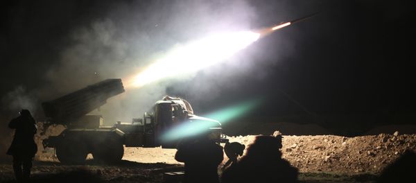 Soldiers from the Syrian army fire a rocket at Islamic State group positions in the province of Raqqa, Syria Soldiers from the Syrian army fire a rocket at Islamic State group positions in the province of Raqqa, Syria - Sputnik International