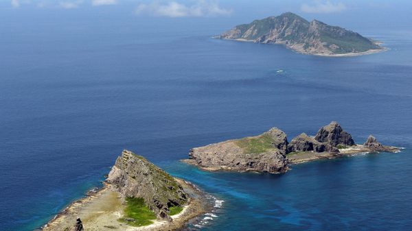 A group of disputed islands, Uotsuri island (top), Minamikojima (bottom) and Kitakojima, known as Senkaku in Japan and Diaoyu in China is seen in the East China Sea (File) A group of disputed islands, Uotsuri island (top), Minamikojima (bottom) and Kitakojima, known as Senkaku in Japan and Diaoyu in China is seen in the East China Sea (File) - Sputnik International