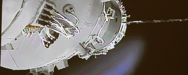 China's Shenzhou-9 manned spacecraft, left, conducts docking with the Tiangong-1 space lab module. China's Shenzhou-9 manned spacecraft, left, conducts docking with the Tiangong-1 space lab module. - Sputnik International