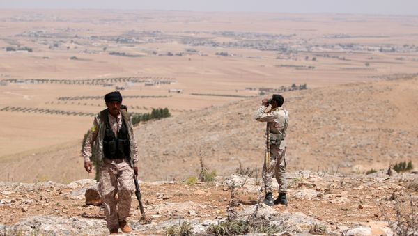 Manbij Military Council fighters take an overwatch position in the southern rural area of Manbij, in Aleppo Governorate, Syria. file photo - Sputnik International