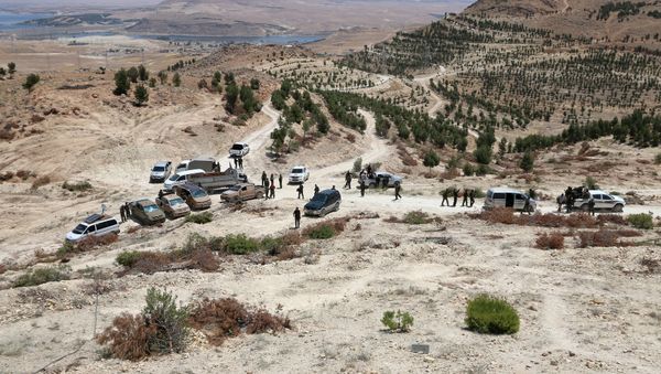 Fighters of the Manbij Military Council and the Syrian Democratic Forces gather in the southern rural area of Manbij, in Aleppo Governorate, Syria. file photo - Sputnik International