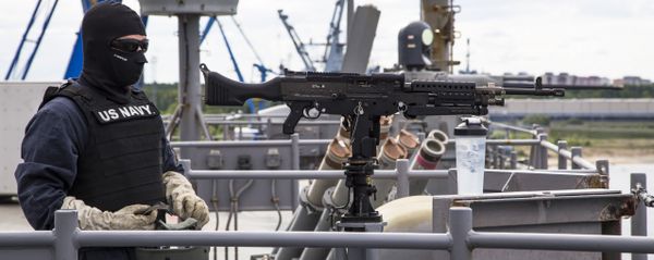 In this photo taken Sunday, June 5, 2016 security personnel of the US Navy guard USS Carter Hall keep watch during the multinational Baltops naval exercise on the Baltic Sea In this photo taken Sunday, June 5, 2016 security personnel of the US Navy guard USS Carter Hall keep watch during the multinational Baltops naval exercise on the Baltic Sea - Sputnik International