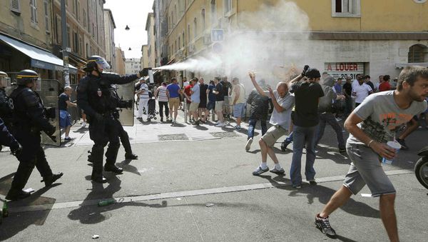 Football Soccer - Euro 2016 - England v Russia - Group B - Stade Velodrome, Marseille, France - 11/6/16 Police use teargas on supporters near port of Marseille before the game - Sputnik International