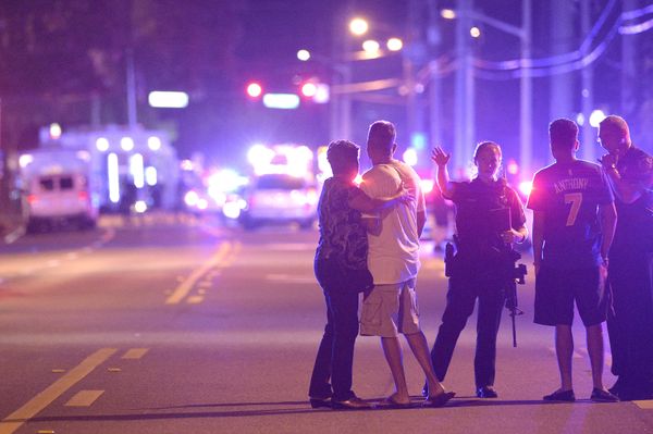 Orlando Police officers direct family members away from a multiple shooting at a nightclub in Orlando, Fla., Sunday, June 12, 2016 Orlando Police officers direct family members away from a multiple shooting at a nightclub in Orlando, Fla., Sunday, June 12, 2016 - Sputnik International