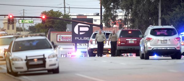 Police cars surround the Pulse Orlando nightclub, the scene of a fatal shooting, in Orlando, Fla., Sunday, June 12, 2016 Police cars surround the Pulse Orlando nightclub, the scene of a fatal shooting, in Orlando, Fla., Sunday, June 12, 2016 - Sputnik International