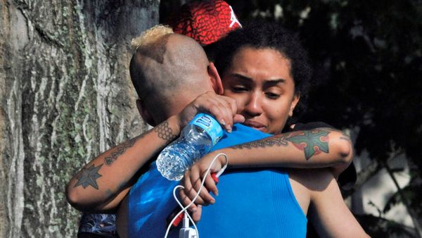 Friends and family members embrace outside the Orlando Police Headquarters during the investigation of a shooting at the Pulse nightclub, where people were killed by a gunman, in Orlando, Florida, U.S June 12, 2016 Friends and family members embrace outside the Orlando Police Headquarters during the investigation of a shooting at the Pulse nightclub, where people were killed by a gunman, in Orlando, Florida, U.S June 12, 2016 - Sputnik International