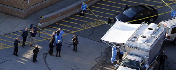 Officials are on the scene outside of Sandy Hook Elementary School in Newtown, Conn., where authorities say a gunman opened fire inside an elementary school in a shooting that left 27 people dead, including 20 children, Friday, Dec. 14, 2012 Officials are on the scene outside of Sandy Hook Elementary School in Newtown, Conn., where authorities say a gunman opened fire inside an elementary school in a shooting that left 27 people dead, including 20 children, Friday, Dec. 14, 2012 - Sputnik International