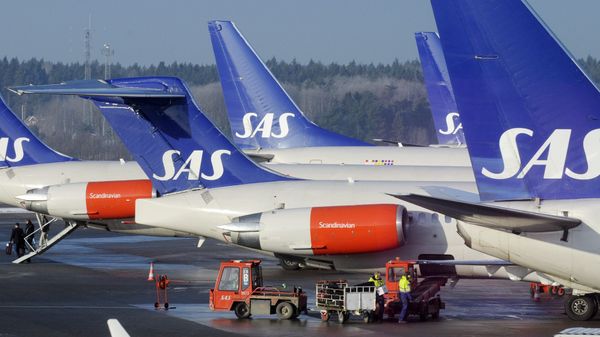 SAS aircraft are seen parked at the gates at terminal 4 of Arlanda Airport near Stockholm SAS aircraft are seen parked at the gates at terminal 4 of Arlanda Airport near Stockholm - Sputnik International