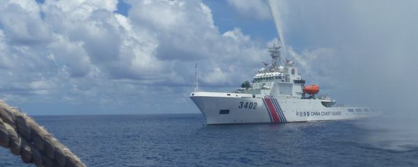 Chinese Coast Guard members approach Filipino fishermen as they confront them off Scarborough Shoal at South China Sea. file photo Chinese Coast Guard members approach Filipino fishermen as they confront them off Scarborough Shoal at South China Sea. file photo - Sputnik International