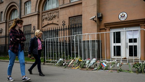 Flowers left outside the US Embassy in Moscow in memory of those killed in the night club shooting in Orlando Flowers left outside the US Embassy in Moscow in memory of those killed in the night club shooting in Orlando - Sputnik International