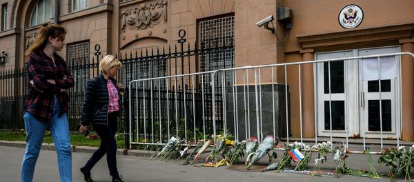 Flowers left outside the US Embassy in Moscow in memory of those killed in the night club shooting in Orlando Flowers left outside the US Embassy in Moscow in memory of those killed in the night club shooting in Orlando - Sputnik International