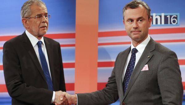 Presidential candidates Norbert Hofer of the Freedom Party (FPOe) and Alexander Van der Bellen (L) who is supported by the Greens party, shake hands before a TV debate after the Austrian presidential election in Vienna, Austria. (File) Presidential candidates Norbert Hofer of the Freedom Party (FPOe) and Alexander Van der Bellen (L) who is supported by the Greens party, shake hands before a TV debate after the Austrian presidential election in Vienna, Austria. (File) - Sputnik International