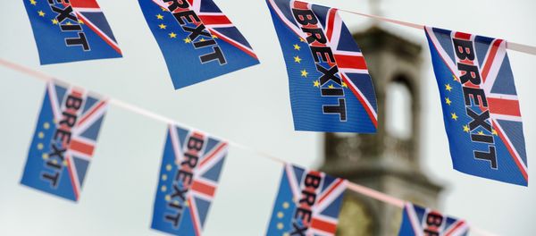 Pro-Brexit flags fly from a fishing boat moored in Ramsgate on June 13, 2016. - Sputnik International