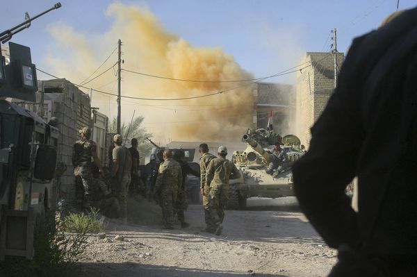 In this Tuesday, June 14, 2016 photo, smoke rises after an airstrike by a US-led coalition warplane as Iraqi security forces advance their position during heavy fighting against Islamic State militants in Fallujah, Iraq - Sputnik International