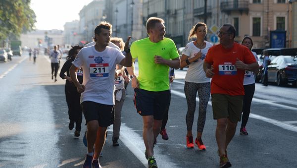 Presidential spokesman Dmitry Peskov, second left, during the SPIEF Race sporting event, organized as part of the St. Petersburg International Economic Forum - Sputnik International