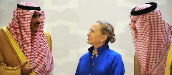 Saudi Foreign Minister Prince Saud Al-Faisal (R), US Secretary of State Hillary Clinton and Kuwaiti Foreign Minister Sheikh Sabah Khaled al-Hamad Al-Sabah speak prior to their group photo with other Gulf counetrparts during their meeting in the Saudi capital of Riyadh, on March 31, 2012 - Sputnik International