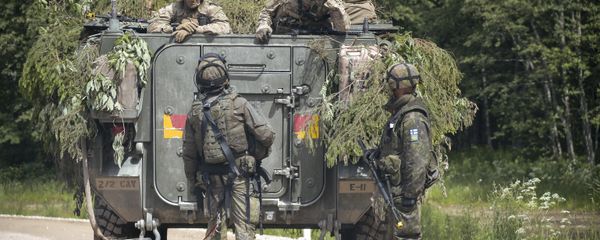 NATO troops at a range in Estonia participating in the Saber Strike-2016 exercises, June 2016. NATO troops at a range in Estonia participating in the Saber Strike-2016 exercises, June 2016. - Sputnik International
