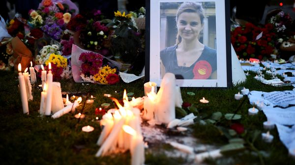 Mourners leave candles in memory of murdered Labour Party MP Jo Cox, who was shot dead in Birstall, during a vigil at Parliament Square in London, Britain June 17, 2016 Mourners leave candles in memory of murdered Labour Party MP Jo Cox, who was shot dead in Birstall, during a vigil at Parliament Square in London, Britain June 17, 2016 - Sputnik International