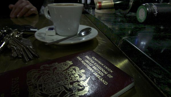 File photo illustration shows a European Union British Passport on the counter of a cafe in Paris. File photo illustration shows a European Union British Passport on the counter of a cafe in Paris. - Sputnik International