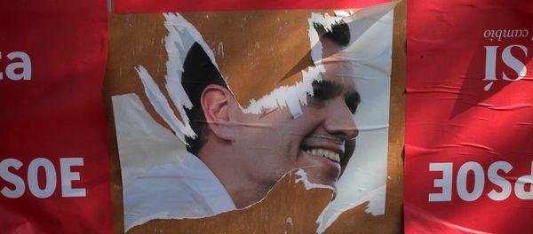 A ripped poster of Spain's Socialist Party (PSOE) leader Pedro Sanchez is seen on a wall in Benalmadena, southern Spain, June 15, 2016. A ripped poster of Spain's Socialist Party (PSOE) leader Pedro Sanchez is seen on a wall in Benalmadena, southern Spain, June 15, 2016. - Sputnik International